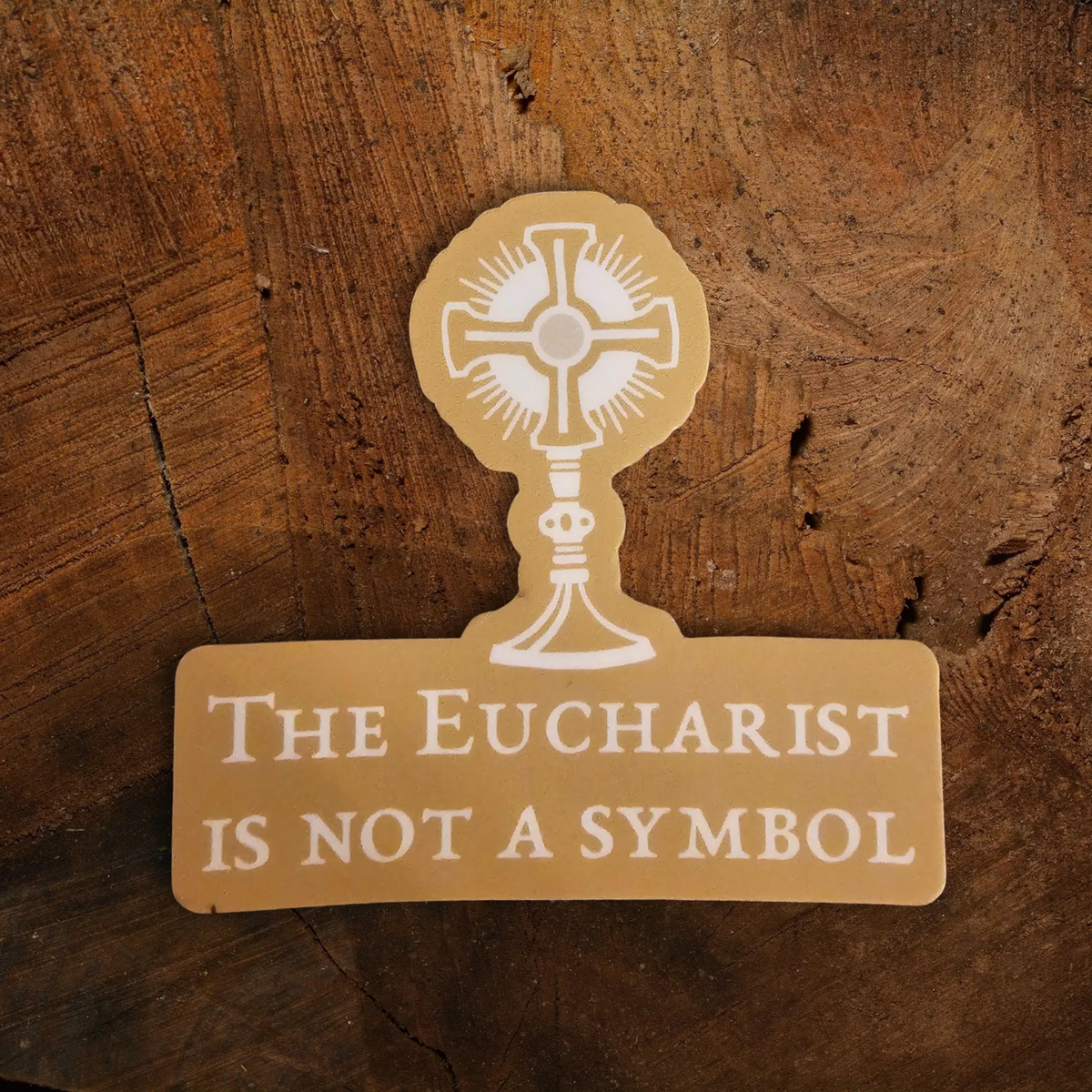 The Eucharist is Not a Symbol Sticker